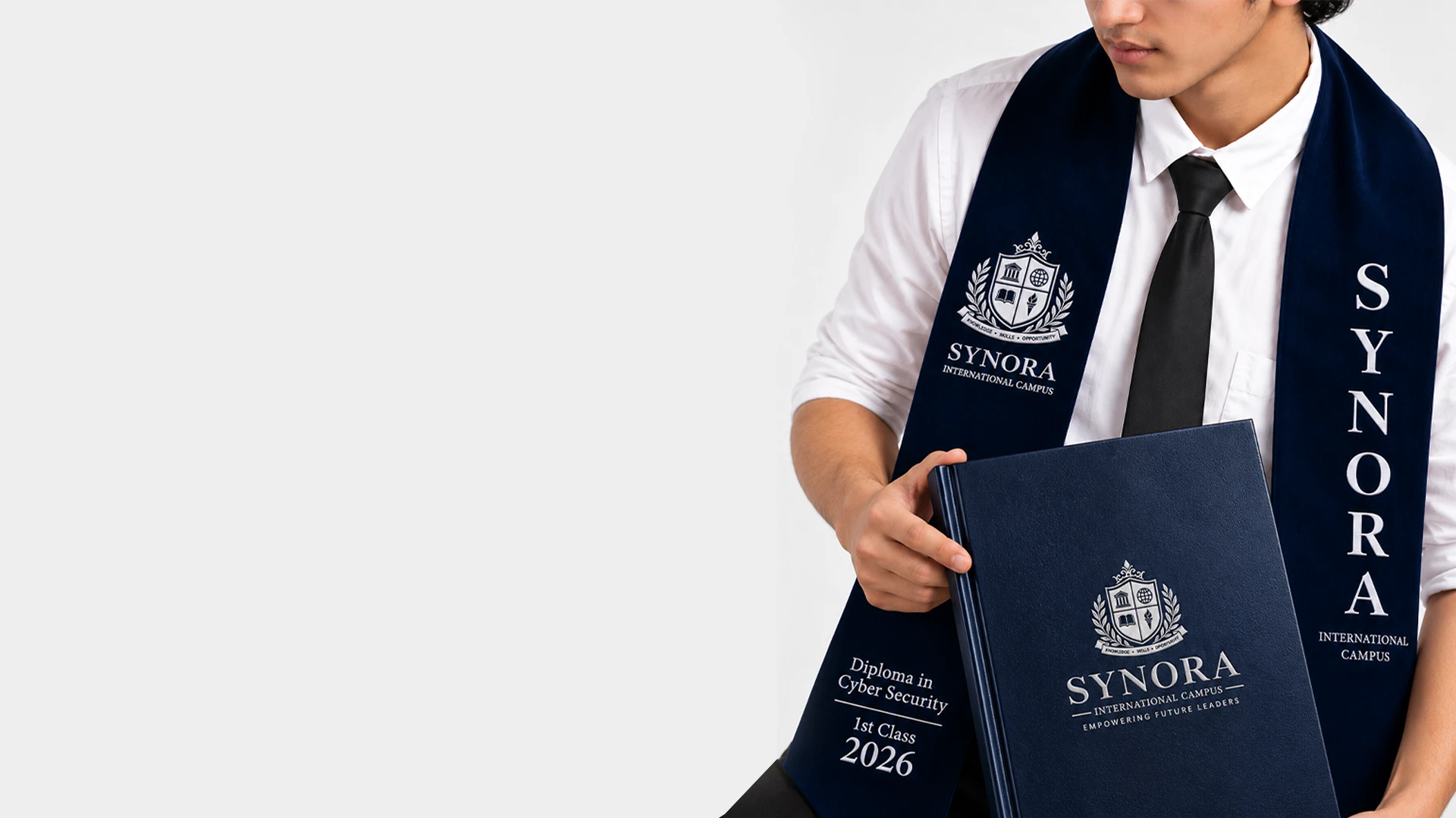 A Synora graduate holding his diploma, wearing the Synora stole